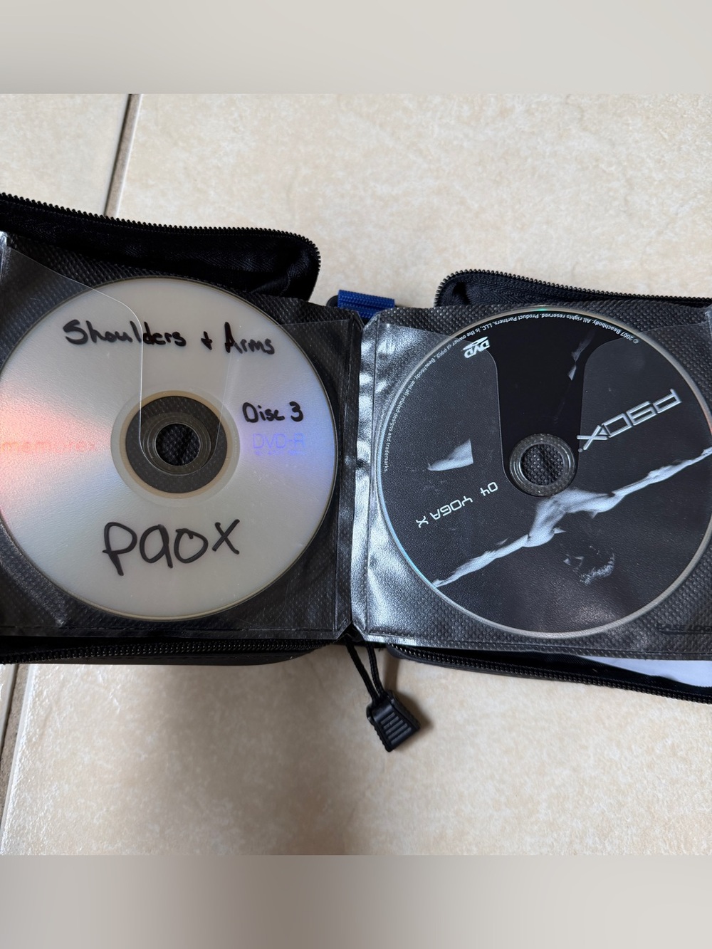 Fitness DVD Lot: P90X Beachbody & Bowflex Workouts with Case Logic Wallet Case